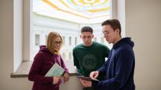 Students talking in the Main Building of the Warsaw University of Technology