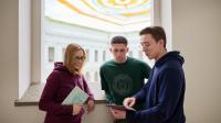 Students talking in the Main Building of the Warsaw University of Technology