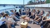 Participants of the summer school during a boat trip on the Vistula River